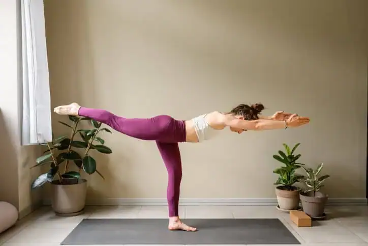 Achieving the Perfect Tone: How Often Should You Exercise for Results? 1 Woman doing Yoga exercise West Drayton to help with toning the body.