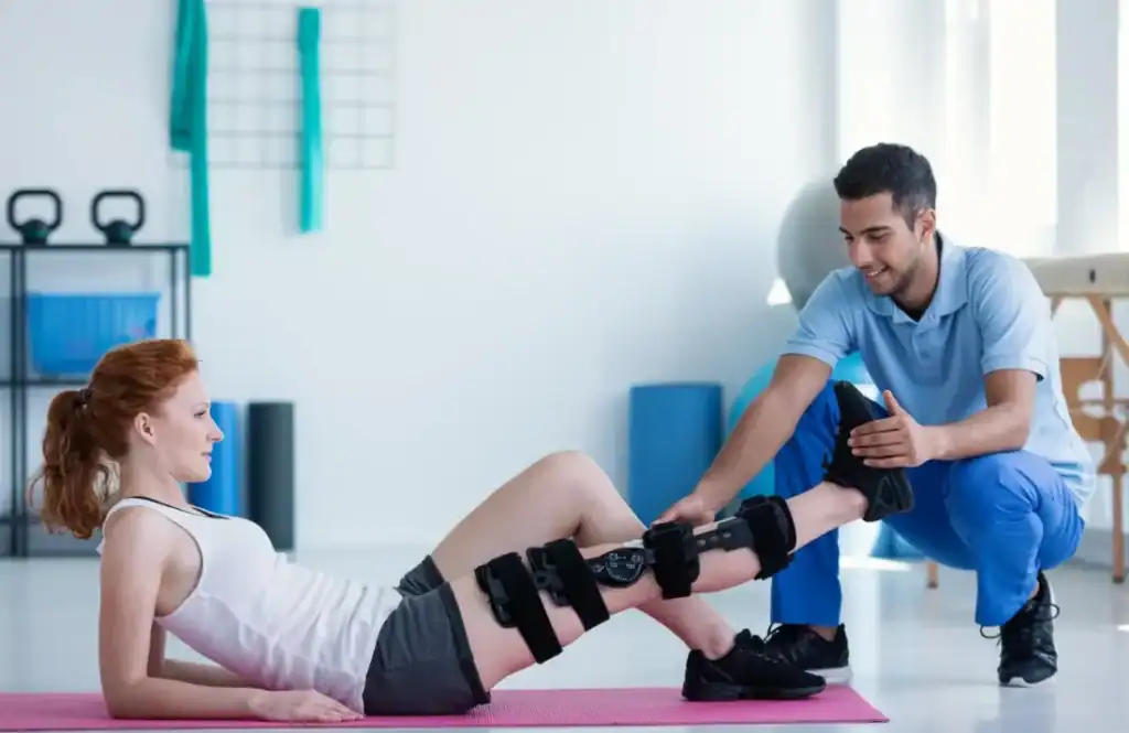 Debunking Meal Timing Myths: The Truth About Muscle Recovery 1 Woman having treatment to help muscle recovery West Drayton after an injury